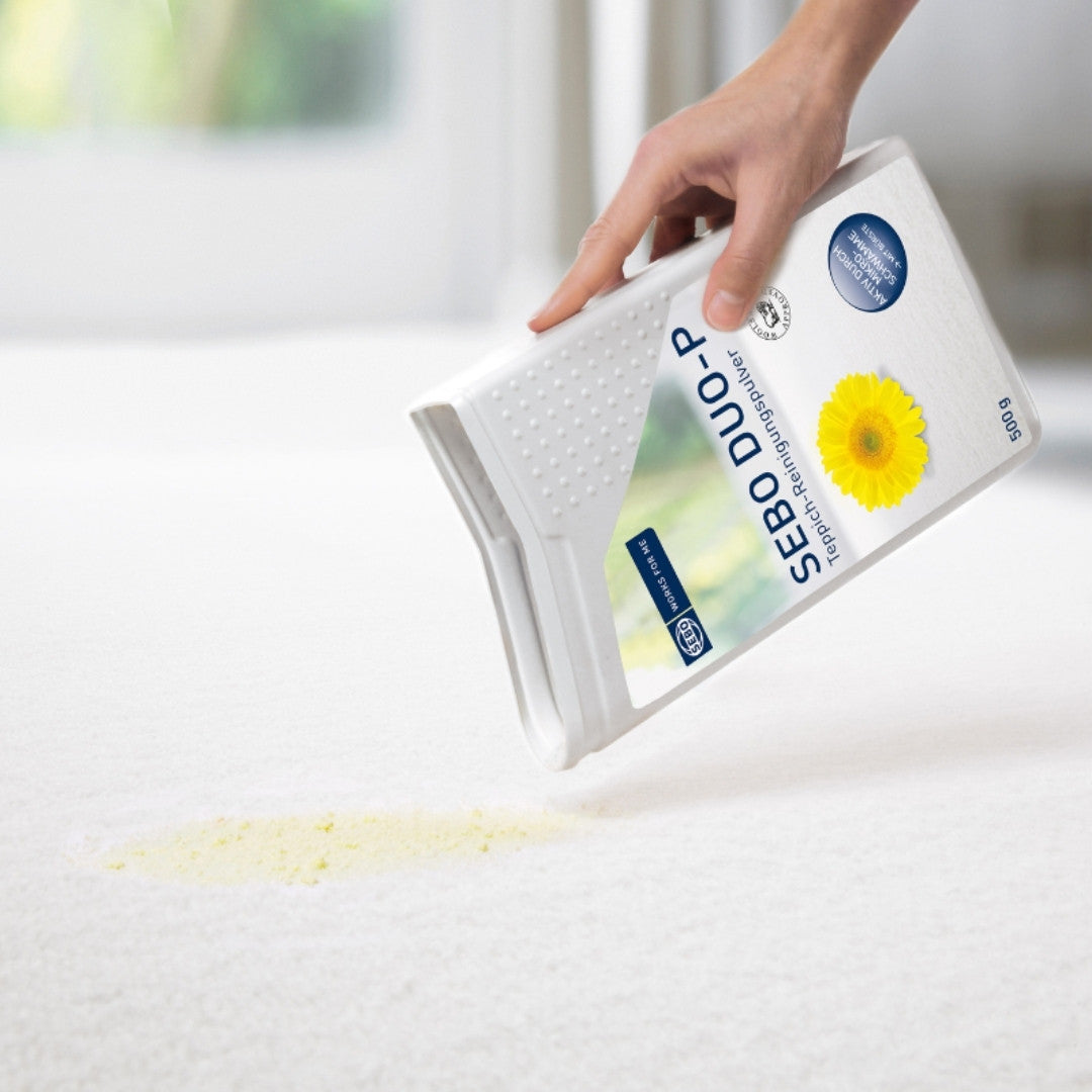 SEBO Duo-P Step 1, Apply the powder to the carpet or upholstery in need of treatment